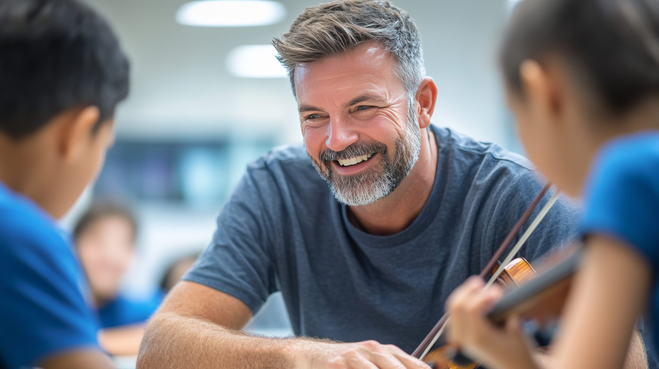 Man working with and encouraging children