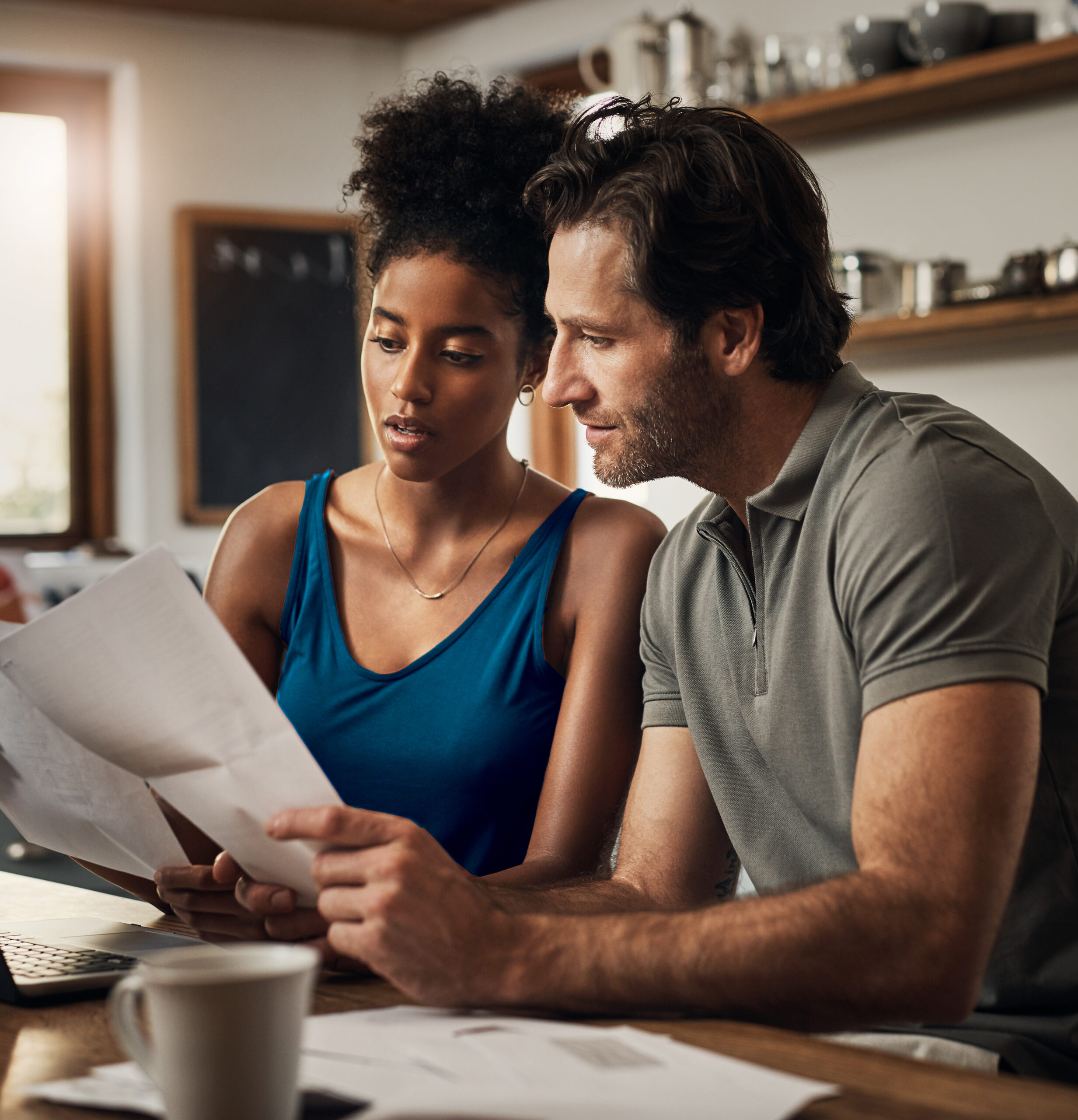 Man and woman looking at financial documents