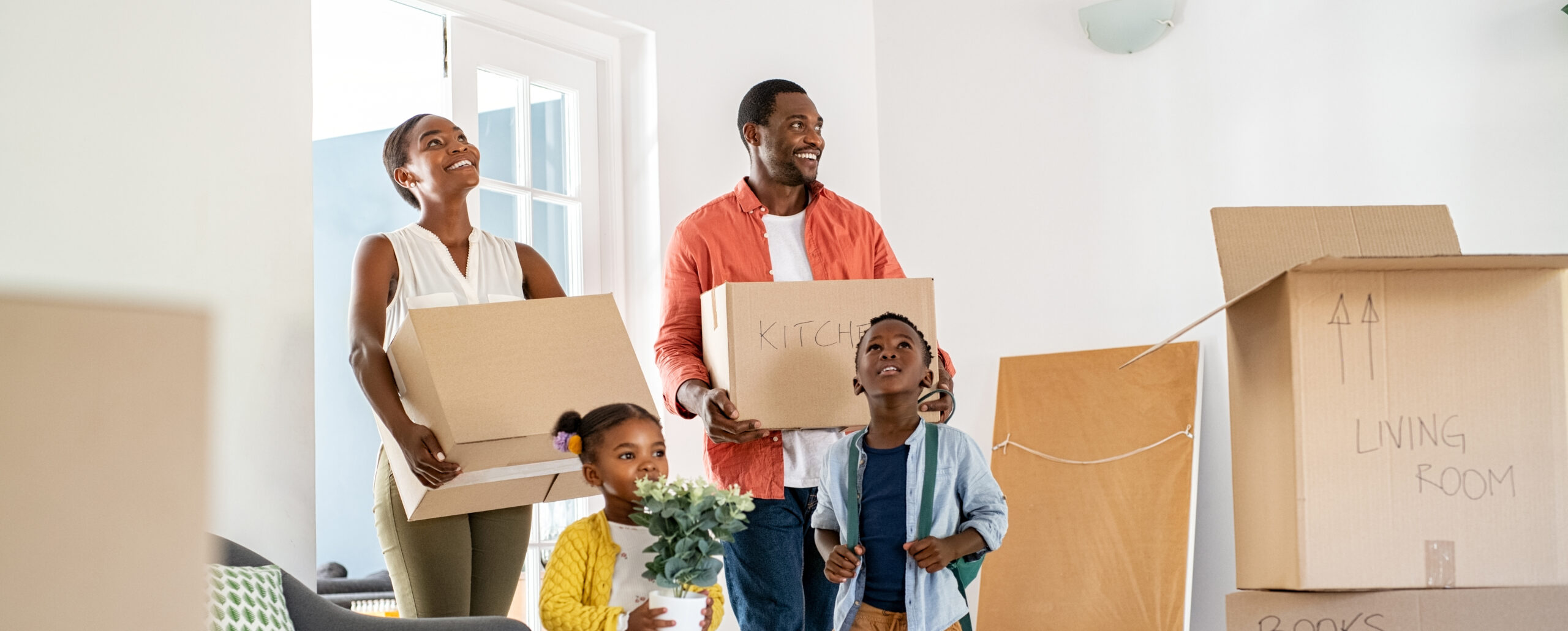Family of four moving into a new home